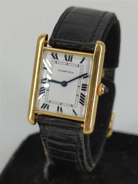 used gold cartier tank watch